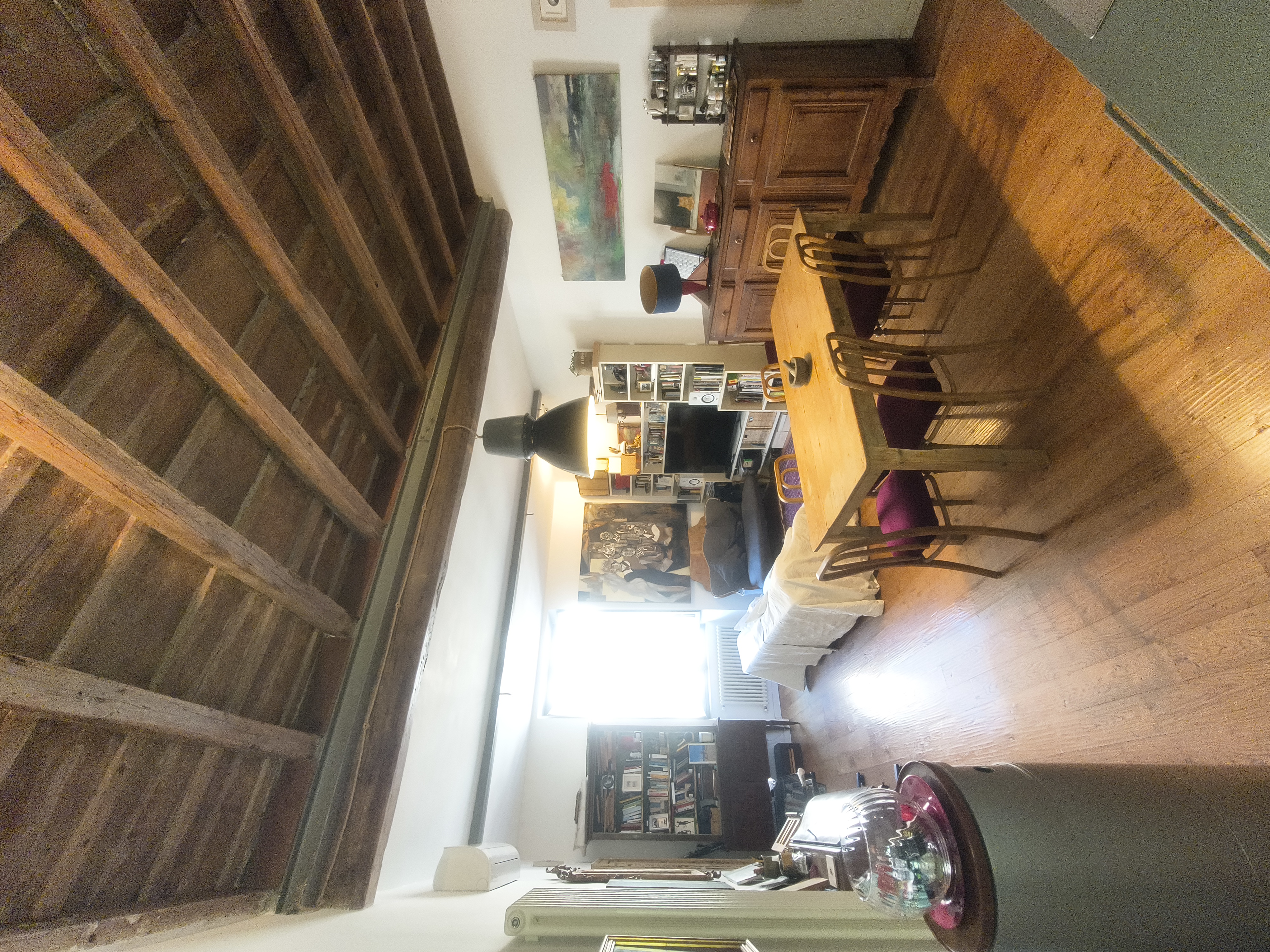 The internal staircase beneath the wooden beams