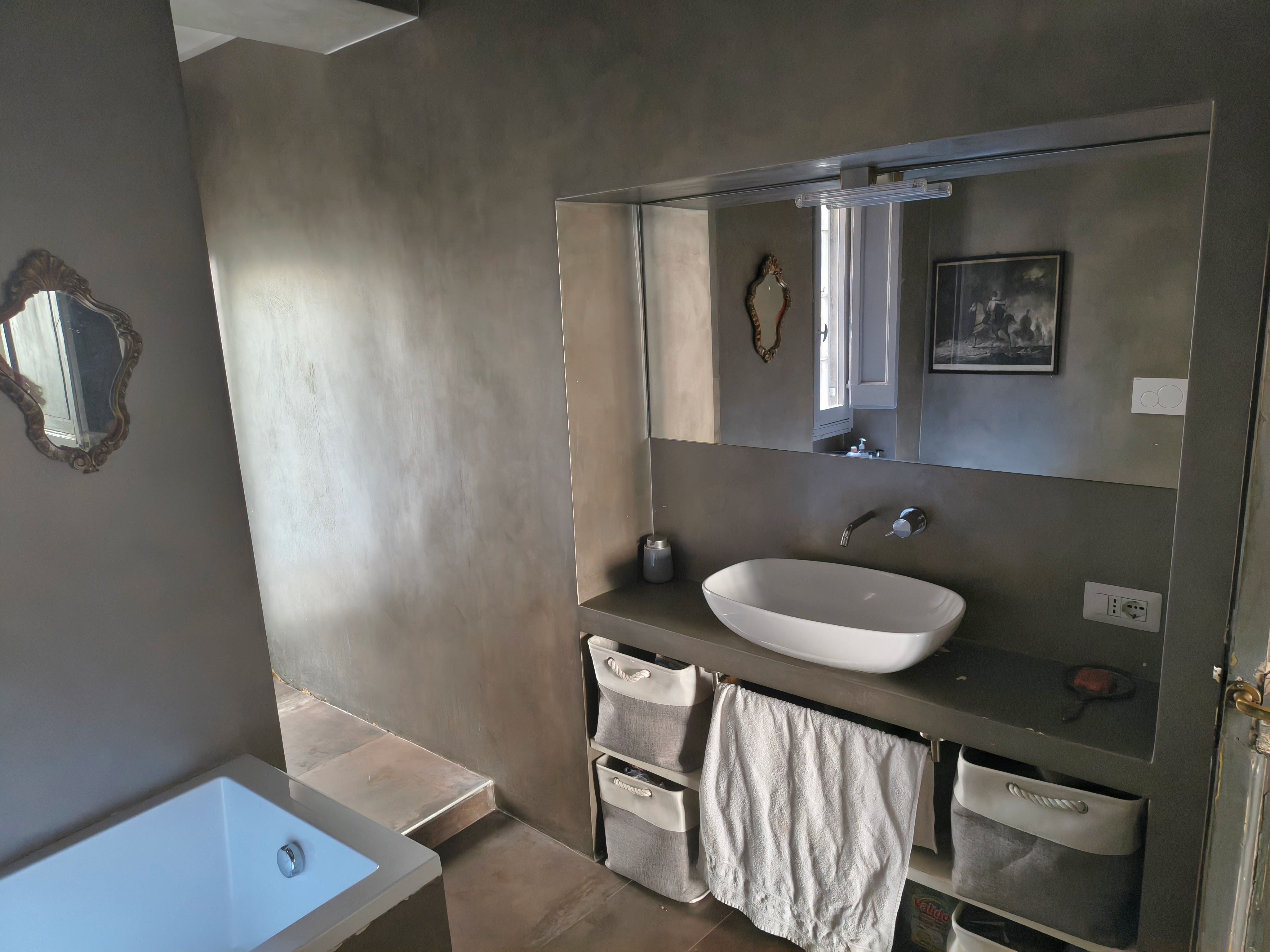 The bathroom with vanity unit