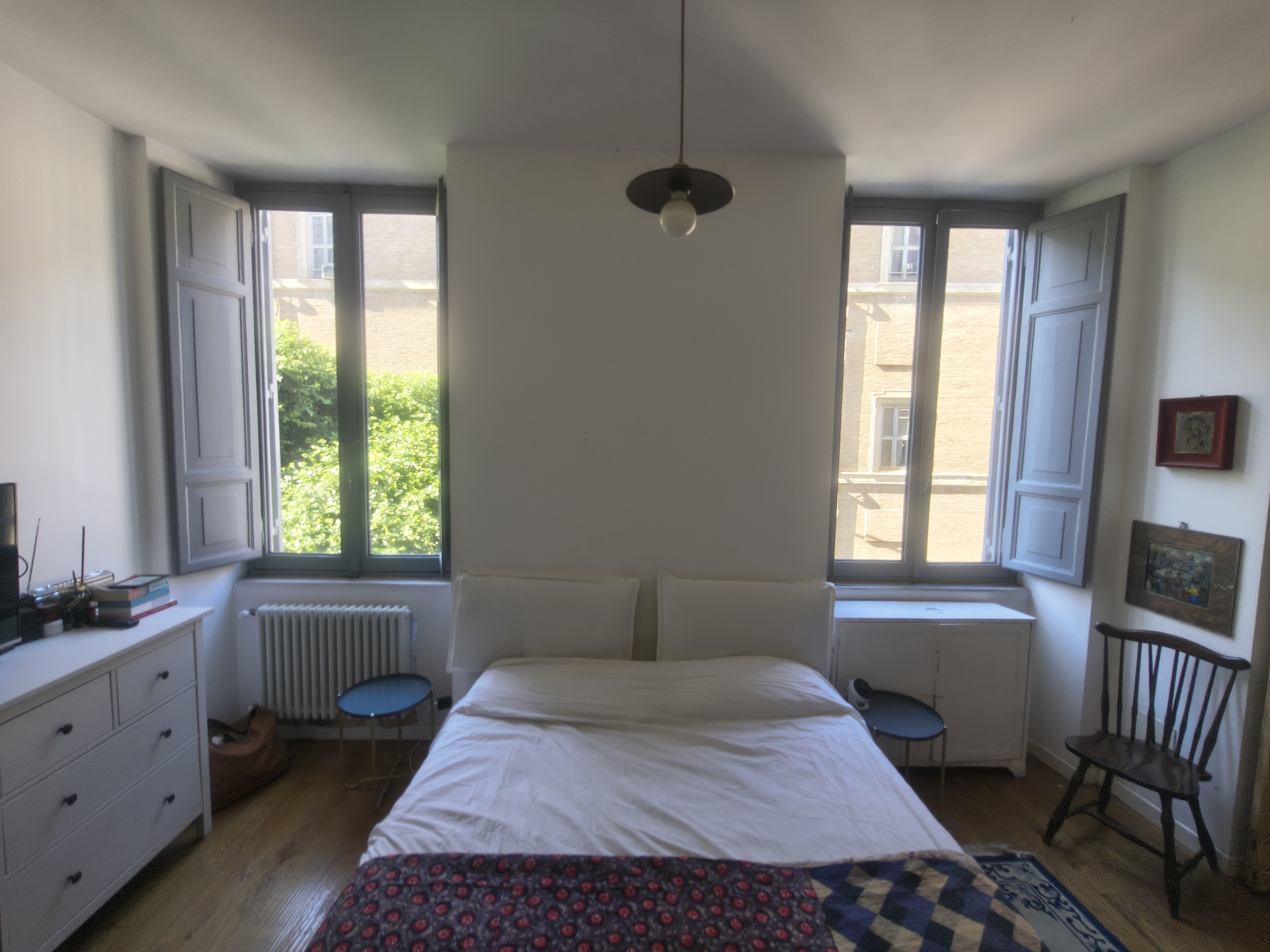 The bedroom with two windows