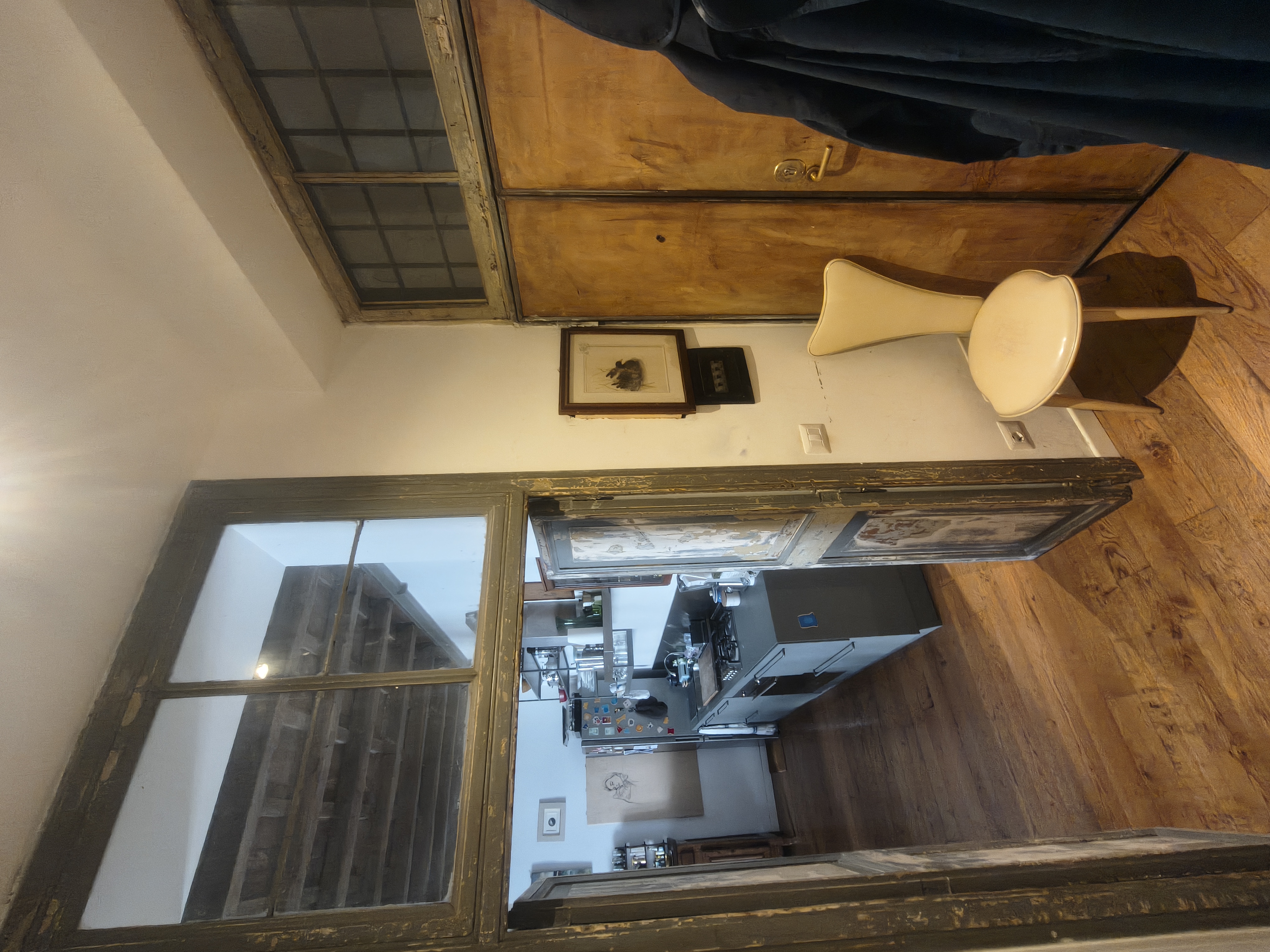 The entrance with wooden wardrobe